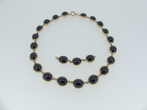 An attractive Garnet and Gold Necklace, formed of twenty closed-backed cabochon garnets, the bolt - Image 3 of 3