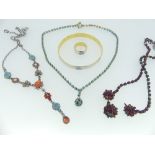A collection of Costume Jewellery, including garnet coloured glass necklace, amber coloured bead
