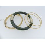 A 9ct yellow gold hinged hollow Bangle, 13.6g, together with a jade hinged bangle, with white