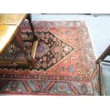Tribal Rugs; a red and indigo blue Qashqai rug, 95½in x 47¼in (242cm x 120cm), together with a small