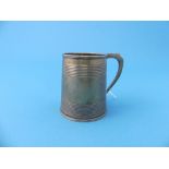 A George III silver Mug, hallmarked London, 1810, of circular form with two bands of reeded