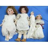 4 Bisque Headed Dolls, including: a Schoenau & Hoffmeister with applied brown hair, open mouth