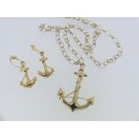 A 9ct yellow god hollow 'Anchor' Pendant, on a 9ct open loop chain, together with a pair of