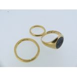 Two 22ct yellow gold Bands, approx total weight 8.9g, together with an 18ct yellow gold signet