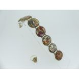 A Scottish moss agate seven plaque Bracelet, the graduated agates mounted in gilt metal with
