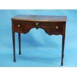 A George III mahogany bow-front Dressing Table, with boxwood stringing and harebell inlays, the