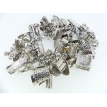 A silver Charm Bracelet, with c.40 charms suspended, most unmarked, approx total weight 4.9ozt