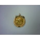 An Elizabeth II gold Sovereign, dated 1978, in 9ct gold horseshoe pendant mount, gross weight 12.