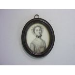 18th century English School, an oval portrait miniature of a young woman, pencil, in oval ebonised