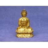 An antique Tibetan gilt bronze temple figure of Avalokiteshvara,
