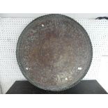 An antique engraved Ottoman circular Tray, made of silvered copper-alloy and engraved with