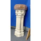 A 19thC Gothic style Holy Water Font, the octagonal pink marble upper part raised upon carved and