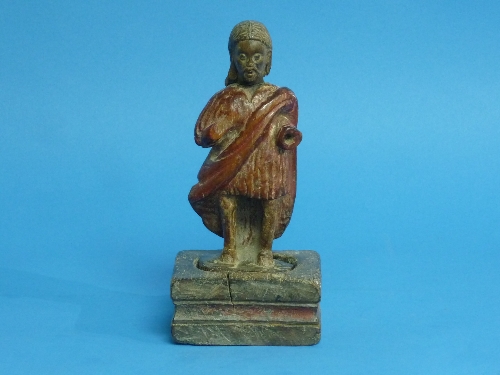 An antique Continental wooden carving or Jesus Christ, the naively-worked standing robed figure