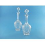 A pair of Victorian engraved glass Decanters and Stoppers, with fine grape and vine decoration 13½in