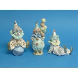 Three Lladro porcelain figurines: all boxed, Littlest Clown, no.5811; Tired Friend, no.5812; and