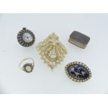 A small collection of Jewellery, including an oval brooch with a surround of seed pearls, the centre