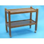 Mouseman: A Robert Thompson of Kilburn English Oak Tea Trolley/Dinner Wagon, with two tiers both