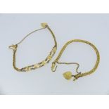 Two Oriental 22ct gold chainlink Bracelets, one with the word 'Lucky' incorporated, the other plain,