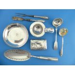 A collection of Silver Items, including a pair of napkin rings, hallmarked London, 1931, of plain