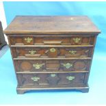 An 18th century oak Carolean-style Chest of Drawers, the rectangular top above four drawers with