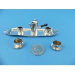 An Edwardian silver eight piece Miniature Tea Set, by Cornelius Desormeaux Saunders & James