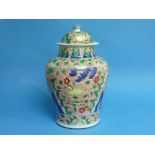 An 18th century Chinese famille verte porcelain Vase and cover, Kangxi period, of baluster form,