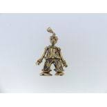 An articulated 9ct gold 'Clown' Pendant, the body set with small red, white and blue pastes, the