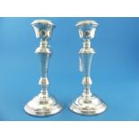 A pair of Elizabeth II silver Candlesticks, by W I Broadway & Co., hallmarked Birmingham, 1972, with