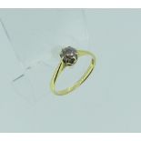 A single stone diamond Ring, the champagne coloured stone of c. 0.35ct, claw set in 18ct yellow gold