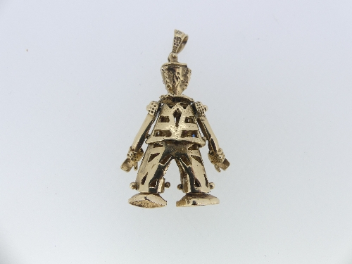 An articulated 9ct gold 'Clown' Pendant, the body set with small red, white and blue pastes, the - Image 2 of 2