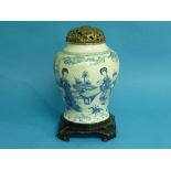 A 19th century Chinese blue and white porcelain Vase, painted with figures in a garden scene, leaf