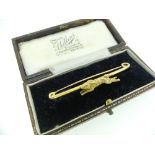 A 9ct yellow gold Bar Brooch, the centre set with a naturalistically modelled running hare, the