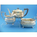 An Edwardian silver three piece Tea Set, by James Dixon & Sons, hallmarked Sheffield, 1905/6, of