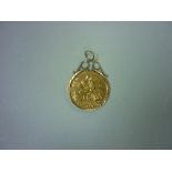 A Victorian gold Sovereign, dated 1900, in 9ct gold pendant mount, gross weight 8.8g.