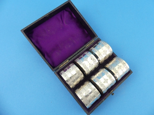 A cased set of six Victorian silver Napkin Rings, by Walter & John Barnard, hallmarked London, 1879,