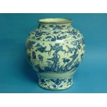 An 18th century oriental blue and white porcelain Vase, of baluster form, painted with wild