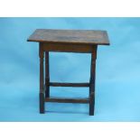 An 18th century and later oak Side Table, the rectangular top above a plain frieze, on turned and