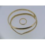 A 9ct yellow gold hinged Bangle, damaged, 5.9g, together with a 9ct yellow and white gold slave