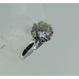 A diamond solitaire Ring, the brilliant cut stone approx. 1.95ct, set in an eight claw scroll mount,