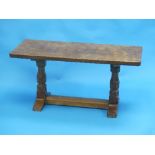 Mouseman: A Robert Thompson of Kilburn English Oak rectangular coffee Table, with carved mouse