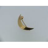 A 9ct gold Brooch, in the form of a crescent moon, unmarked but tested, approx weight 12.5g.