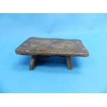 An 18th century oak provincial Footstool.