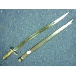 A French Franco-Prussian War period Bayonet and scabbard, circa 1870, the saber-style bayonet with