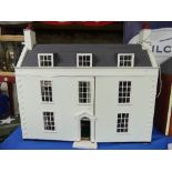 A Very Large White Dolls House, wooden dolls house, wired for electric lighting. Hinged roof opening