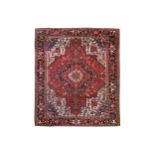 A HERIZ CARPET, NORTH-WEST PERSIA approx: 9ft. x 7ft.8in.(274cm. x 234cm.) Good colour combination