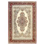 A FINE QUM RUG, CENTRAL PERSIA approx: 7ft. x 4ft.6in.(213cm. x 137cm.) Nice and well drawn bold