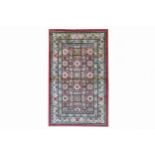 A FINE SILK KHOTAN RUG, EAST TURKESTAN approx: 6ft.10in. x 4ft.1in.(208cm. x 124cm.) The field