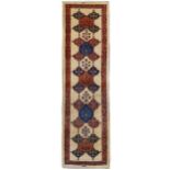 A FINE SIGNED KASHKULI RUNNER, SOUTH-WEST PERSIA approx: 9ft.6in. x 2ft.9in.(289cm. x 84cm.) Very