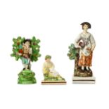 THREE STAFFORDSHIRE POTTERY FIGURES