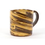 AN AGATE WARE POTTERY FROG MUG